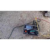 What is the acceptable grounding resistance value for a lightning protection system?