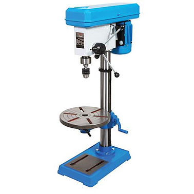 Bench drilling machine in an industrial workshop repair context