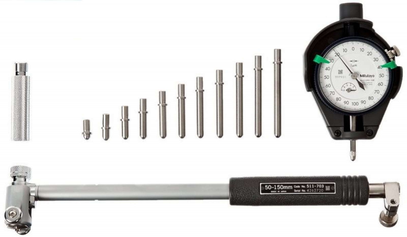 Mechanical measuring instruments being checked during inspection service