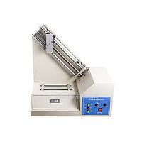 Material adhesion tester