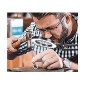 What is the role of handheld magnifiers today?